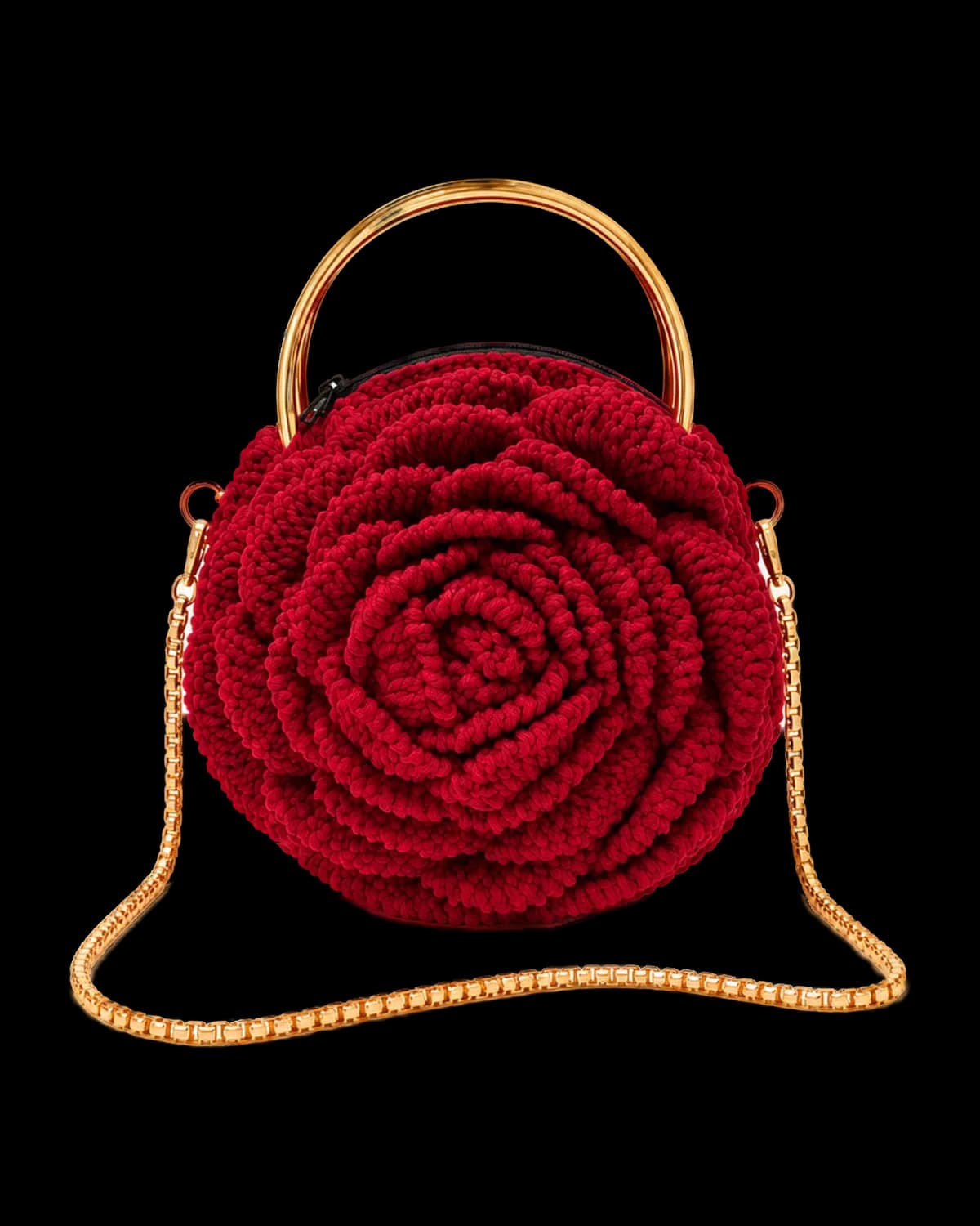 Crimson Rose Handbag: a round deep-red crochet rose bag with a gold-tone ring handle and box-chain strap on a cream background