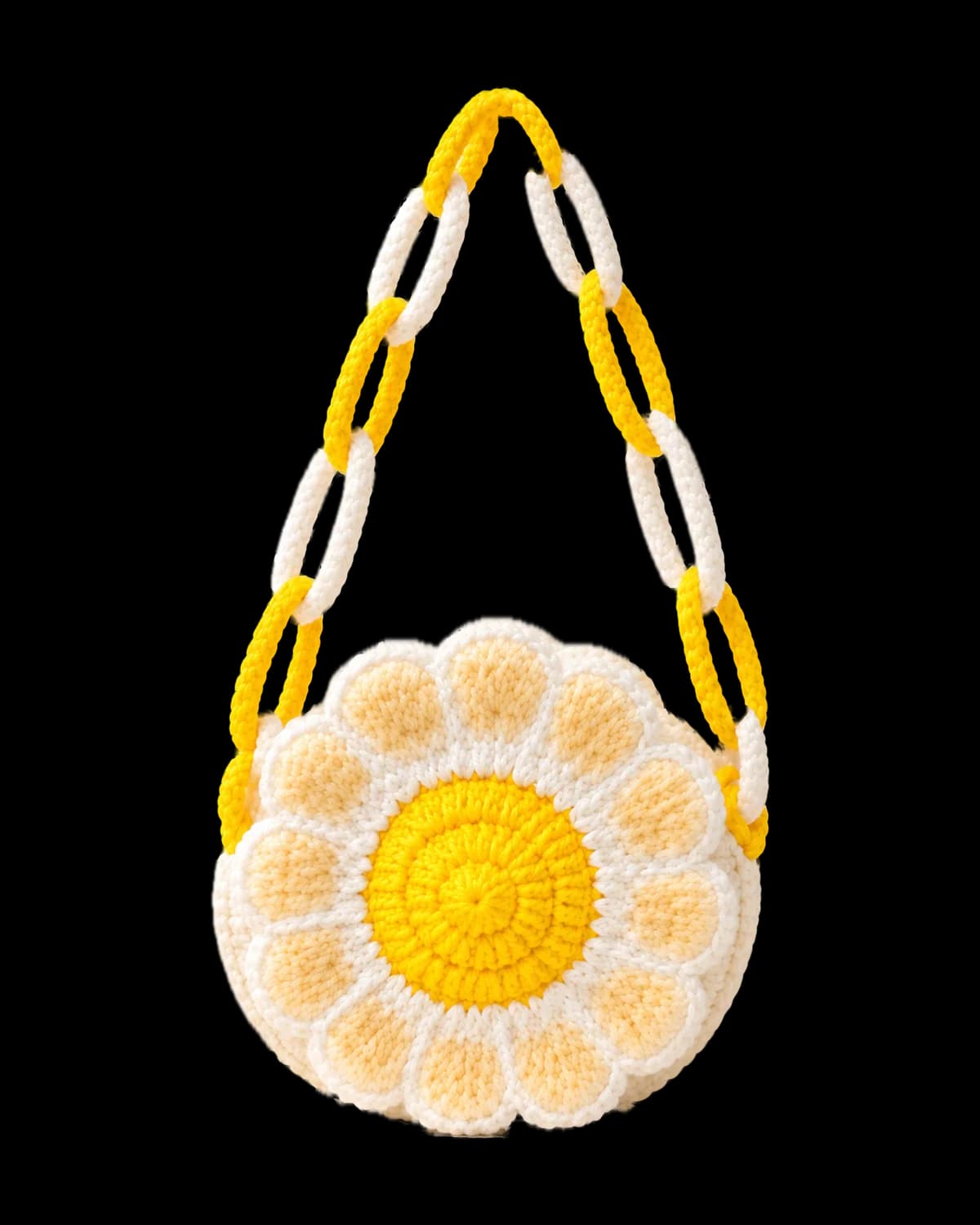 Round crochet daisy bag with a bright yellow centre, butter-yellow petals outlined in white and a white and yellow chain-link strap, on a cream background