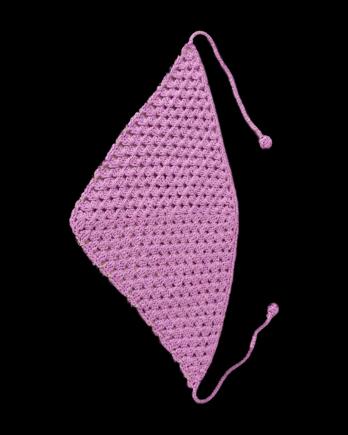 Lilac granny-stitch crochet bandana with a light-green vine of dark-purple flowers and crochet ties, laid flat on cream