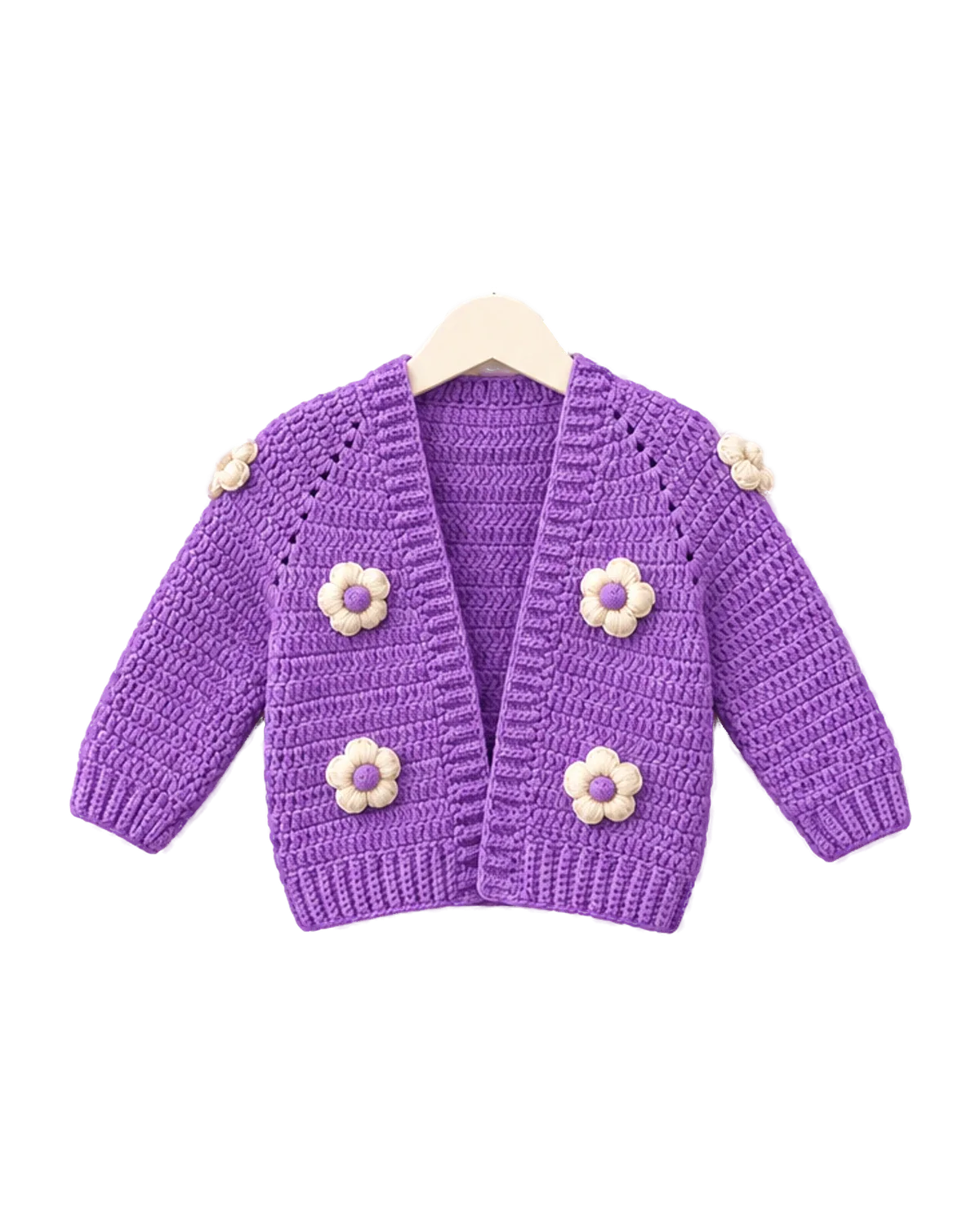 Purple crochet baby cardigan with white flower appliqués, on a little hanger